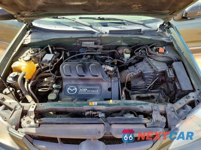 Zdjęcie 11 z 12 samochodu: 2002 MAZDA TRIBUTE LX VIN:4F2YU08142KM07136 - miniatura