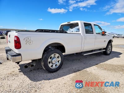 Trzecie zdjęcie samochodu z tyłu: 2014 FORD F350 SUPER DUTY VIN:1FT8W3BT8EEA10182 - miniatura