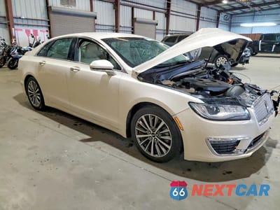 Czwarte zdjęcie samochodu z boku: 2018 LINCOLN MKZ PREMIERE VIN:3LN6L5A9XJR615924 - miniatura