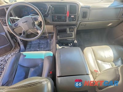 Zdjęcie 8 z 12 samochodu: 2004 GMC YUKON XL DENALI VIN:1GKFK66U24J203624 - miniatura