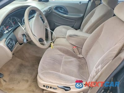 Zdjęcie 7 z 11 samochodu: 1999 FORD TAURUS SE VIN:1FAFP53U3XG120044 - miniatura