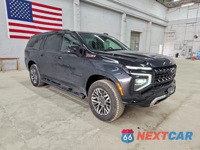 Czwarte zdjęcie samochodu z boku: 2026 CHEVROLET SUBURBAN K1500 Z71 VIN:1GNS6DKD1TR232161 - miniatura