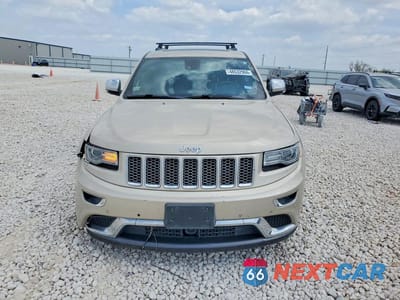 Piąte zdjęcie samochodu w środku: 2014 JEEP GRAND CHEROKEE SUMMIT VIN:1C4RJFJM7EC299033 - miniatura