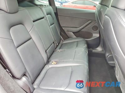 Zdjęcie 10 z 13 samochodu: 2024 TESLA MODEL Y VIN:7SAYGDEF5RF033449 - miniatura