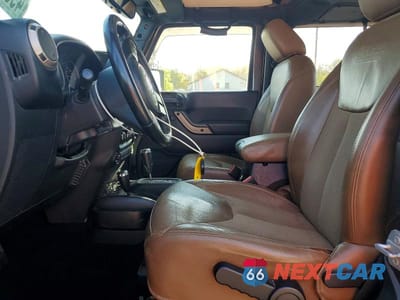 Zdjęcie 7 z 12 samochodu: 2016 JEEP WRANGLER SAHARA VIN:1C4GJWBG8GL322323 - miniatura