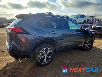 Trzecie zdjęcie samochodu z tyłu: 2023 TOYOTA RAV4 PRIME XSE VIN:JTMEB3FV1PD140209 - miniatura
