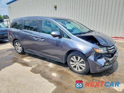 Czwarte zdjęcie samochodu z boku: 2016 HONDA ODYSSEY SE VIN:5FNRL5H36GB113540 - miniatura