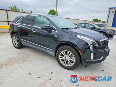 Czwarte zdjęcie samochodu z boku: 2020 CADILLAC XT5 PREMIUM LUXURY VIN:1GYKNCRS7LZ197341 - miniatura