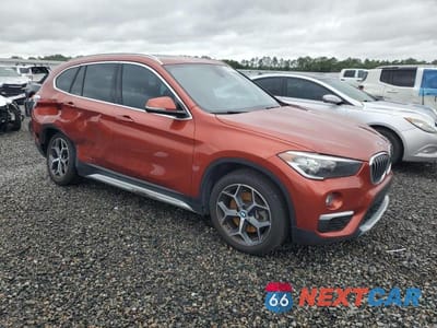 Czwarte zdjęcie samochodu z boku: 2018 BMW X1 XDRIVE28I VIN:WBXHT3C39J5L35007 - miniatura