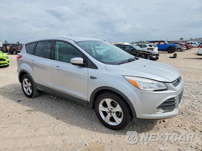 Czwarte zdjęcie samochodu z boku: 2014 FORD ESCAPE VIN:1FMCU0G76FUA72595 - miniatura