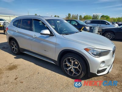 Czwarte zdjęcie samochodu z boku: 2017 BMW X1 XDRIVE28I VIN:WBXHT3C31H5F72040 - miniatura