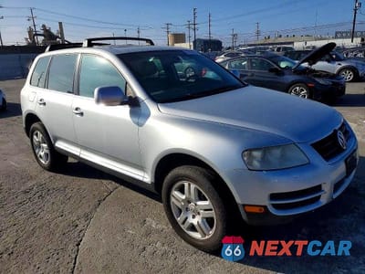 Czwarte zdjęcie samochodu z boku: 2006 VOLKSWAGEN TOUAREG 4.2 VIN:WVGZM77L16D054733 - miniatura