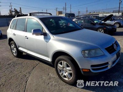 Czwarte zdjęcie samochodu z boku: 2006 VOLKSWAGEN TOUAREG 4.2 VIN:WVGZM77L16D054733 - miniatura