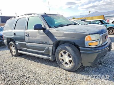 Czwarte zdjęcie samochodu z boku: 2003 GMC YUKON DENALI VIN:1GKEK63U63J244756 - miniatura