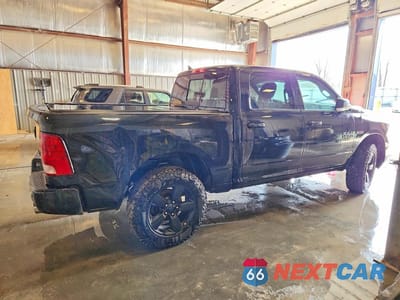 Trzecie zdjęcie samochodu z tyłu: 2018 RAM 1500 SLT VIN:1C6RR7LMXJS354528 - miniatura