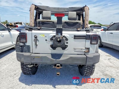 Zdjęcie 6 z 13 samochodu: 2010 JEEP WRANGLER SPORT VIN:1J4AA2D19AL119997 - miniatura