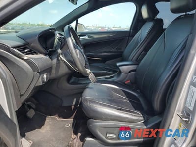 Zdjęcie 7 z 12 samochodu: 2017 LINCOLN MKC PREMIERE VIN:5LMCJ1C96HUL33844 - miniatura