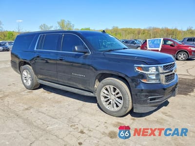 Czwarte zdjęcie samochodu z boku: 2018 CHEVROLET SUBURBAN K1500 LS VIN:1GNSKGKC2JR122818 - miniatura