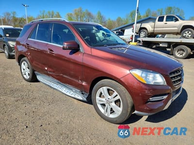 Czwarte zdjęcie samochodu z boku: 2015 MERCEDES-BENZ ML 350 4MATIC VIN:4JGDA5HB1FA547374 - miniatura