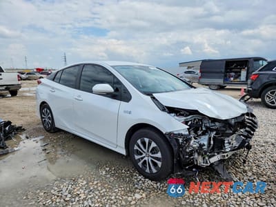 Czwarte zdjęcie samochodu z boku: 2021 TOYOTA PRIUS PRIME XLE VIN:JTDKAMFP6M3178601 - miniatura