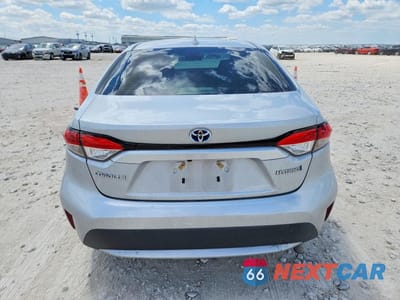 Zdjęcie 6 z 12 samochodu: 2022 TOYOTA COROLLA HYBRID LE VIN:JTDEAMDE4N3008625 - miniatura