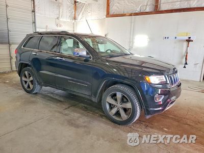 Czwarte zdjęcie samochodu z boku: 2014 JEEP GRAND CHEROKEE OVERLAND VIN:1C4RJFCT0EC385143 - miniatura