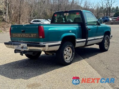 Czwarte zdjęcie samochodu z boku: 2005 GMC SIERRA VIN:1GTEK14HX52508769 - miniatura