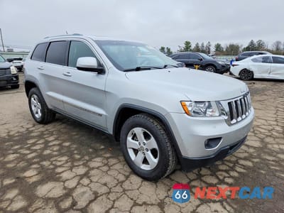Czwarte zdjęcie samochodu z boku: 2011 JEEP GRAND CHEROKEE LAREDO VIN:1J4RR4GG5BC731543 - miniatura