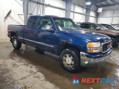 Czwarte zdjęcie samochodu z boku: 2001 GMC NEW SIERRA K1500 VIN:1GTEK19T91E234046 - miniatura