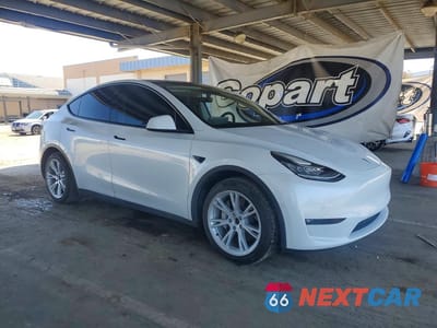 Czwarte zdjęcie samochodu z boku: 2021 TESLA MODEL Y VIN:5YJYGAEE8MF252014 - miniatura