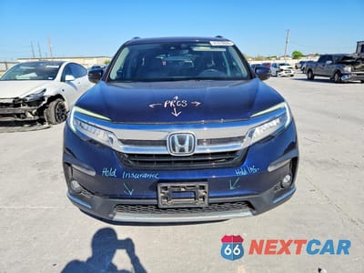 Piąte zdjęcie samochodu w środku: 2020 HONDA PILOT TOURING VIN:5FNYF5H6XLB012556 - miniatura