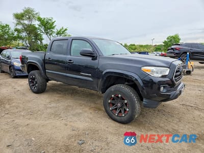 Czwarte zdjęcie samochodu z boku: 2018 TOYOTA TACOMA SR5 V6 VIN:3TMAZ5CN4JM059307 - miniatura