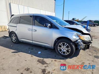 Czwarte zdjęcie samochodu z boku: 2012 HONDA ODYSSEY EXL VIN:5FNRL5H66CB028699 - miniatura