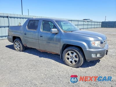 Czwarte zdjęcie samochodu z boku: 2009 HONDA RIDGELINE RTL VIN:5FPYK16589B500130 - miniatura