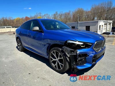 Czwarte zdjęcie samochodu z boku: 2020 BMW X6 M50I VIN:5UXCY8C06L9B12934 - miniatura