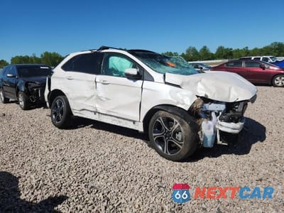 Czwarte zdjęcie samochodu z boku: 2019 FORD EDGE ST VIN:2FMPK4AP0KBB66673 - miniatura