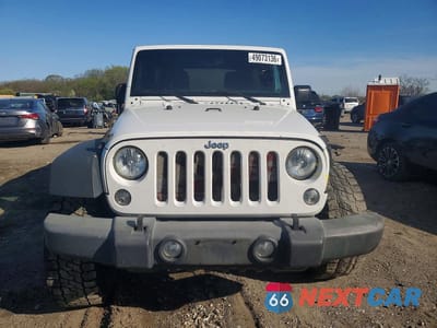 Piąte zdjęcie samochodu w środku: 2016 JEEP WRANGLER UNLIMITED SPORT VIN:1C4BJWDG1GL248072 - miniatura