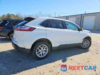 Trzecie zdjęcie samochodu z tyłu: 2023 FORD EDGE SEL VIN:2FMPK4J95PBA01338 - miniatura