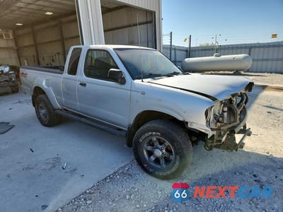 Czwarte zdjęcie samochodu z boku: 2004 NISSAN FRONTIER KING CAB XE V6 VIN:1N6ED26Y14C461101 - miniatura
