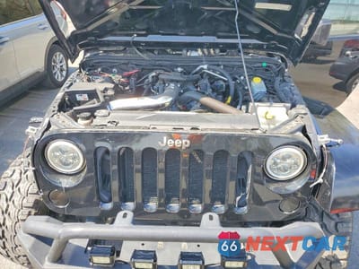 Zdjęcie 12 z 13 samochodu: 2010 JEEP WRANGLER UNLIMITED SPORT VIN:1J4BA3H11AL119996 - miniatura