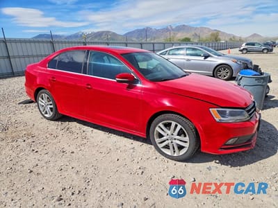 Czwarte zdjęcie samochodu z boku: 2015 VOLKSWAGEN JETTA TDI VIN:3VWLA7AJ6FM331761 - miniatura