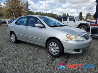 Czwarte zdjęcie samochodu z boku: 2003 TOYOTA COROLLA LE VIN:1NXBR32E13Z033879 - miniatura