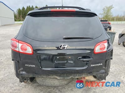 Zdjęcie 6 z 14 samochodu: 2010 HYUNDAI SANTA FE GLS VIN:5NMSG3AB1AH396253 - miniatura