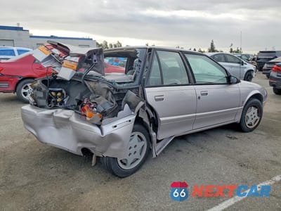 Trzecie zdjęcie samochodu z tyłu: 1995 SATURN SL2 VIN:1G8ZK5275SZ381569 - miniatura