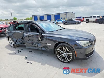 Czwarte zdjęcie samochodu z boku: 2014 BMW 740 LI VIN:WBAYE4C55ED137998 - miniatura