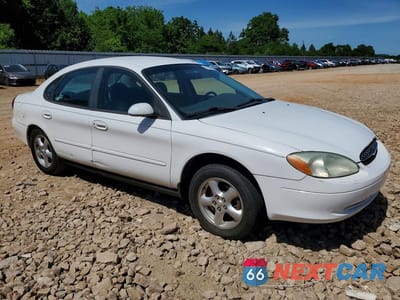 Czwarte zdjęcie samochodu z boku: 2002 FORD TAURUS SE VIN:1FAFP53UX2A122305 - miniatura