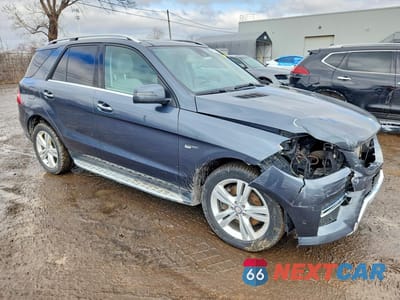 Czwarte zdjęcie samochodu z boku: 2014 MERCEDES-BENZ ML 350 BLUETEC VIN:4JGDA2EB2EA406802 - miniatura