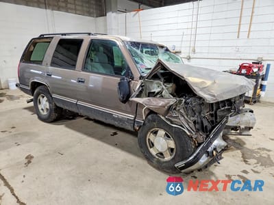 Czwarte zdjęcie samochodu z boku: 1997 GMC YUKON VIN:1GKEK13R9VJ737493 - miniatura