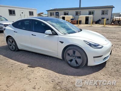 Czwarte zdjęcie samochodu z boku: 2023 TESLA MODEL 3 VIN:5YJ3E1EA4PF501314 - miniatura