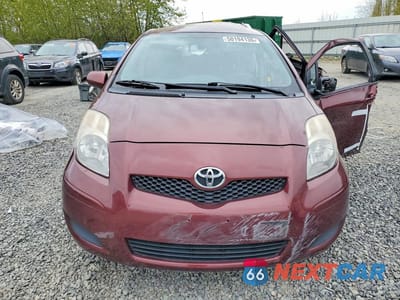 Piąte zdjęcie samochodu w środku: 2010 TOYOTA YARIS BASE VIN:JTDKT4K36A5296015 - miniatura